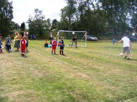 children playing football