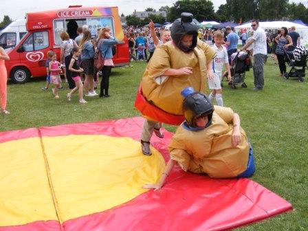 Inflatable sumo wrestlers fighting